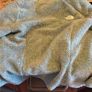 Teal/green fleece women’s north face jacket
